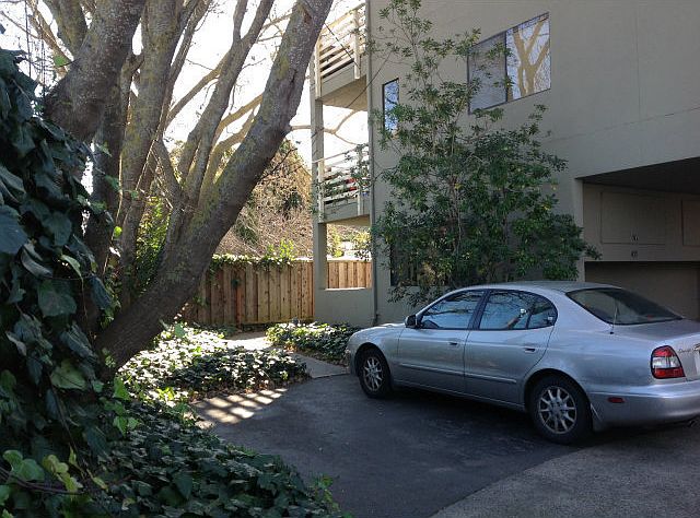 Ground floor condo with two patios, one outside of living room, one outside of bedroom.