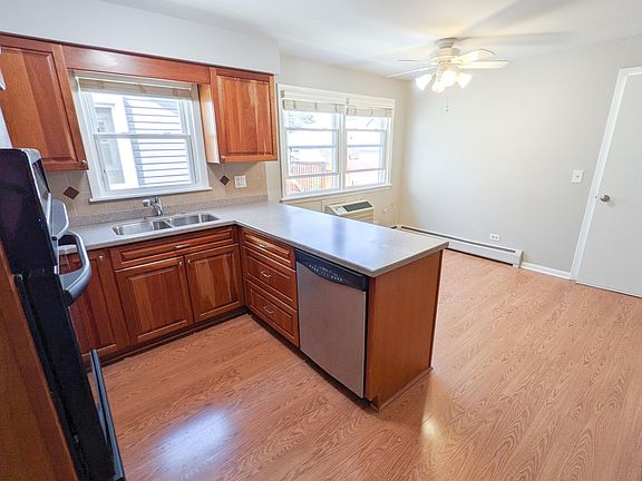 2nd image of 6031 N Austin Ave #1
