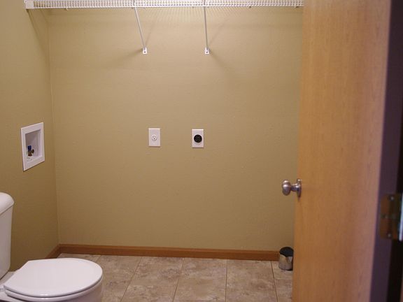 1/2 bath on the main level includes laundry hookups