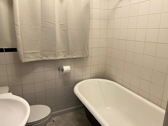 Bathroom Clawfoot tub with shower Sink and vanity with storage 2 Medicine cabinets with storage and mirror