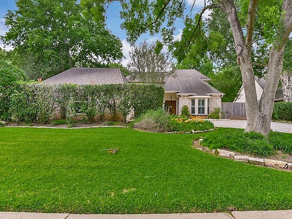 Mature trees and a spacious front side yard, too!