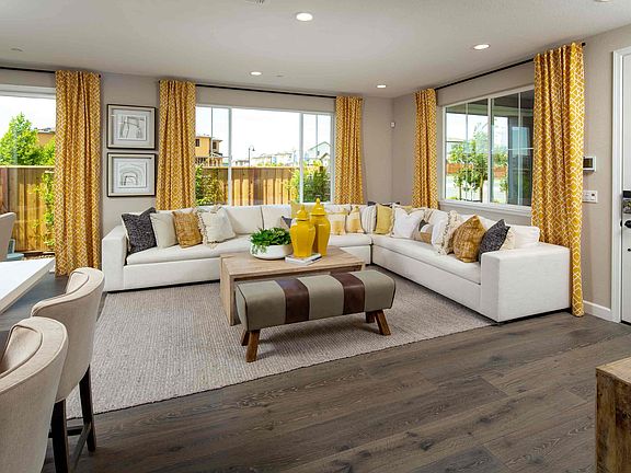 This fresh two-story attached home at Horizon at One Lake comes equipped with all the trappings of m