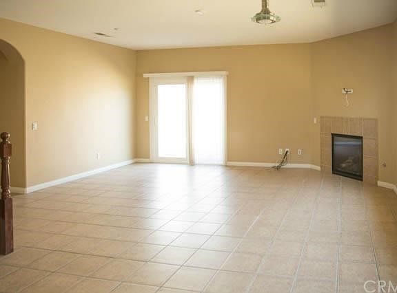 The Living Room with Fireplace.