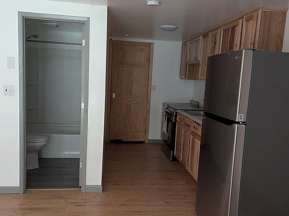 Entryway, kitchen and bathroom