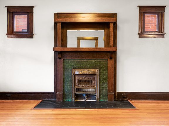 Beautiful original 1913 mantle and decorative fireplace with Denver Tile.