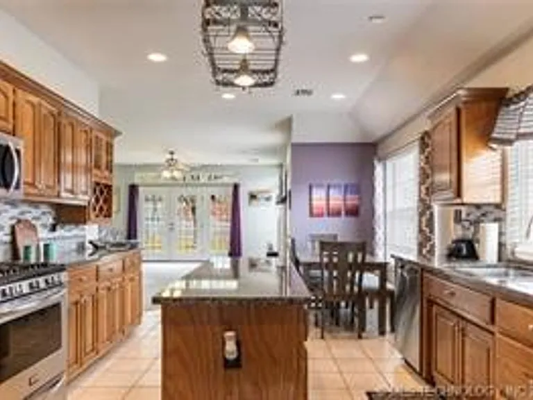 13609 E 90th Ct N — Photo 13