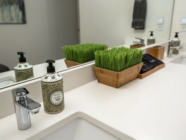 Bathrooms are thoughtfully stocked with plush towels, hand soap, and everyday essentials, providing all the comforts of home for a relaxing and convenient stay.