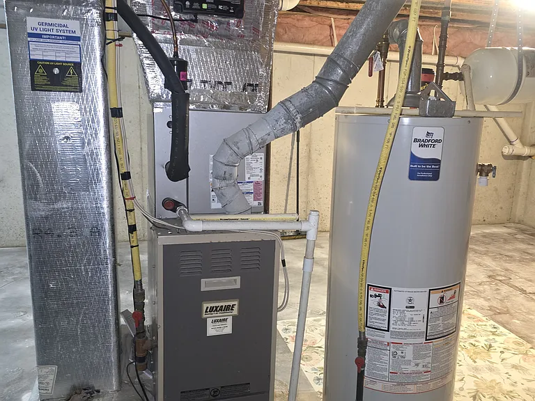 Forced Air for Heating and Cooling.

Water Heater is 50 Gallon and was replaced in 2024