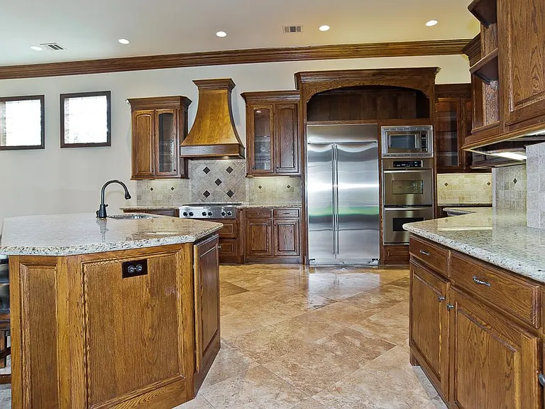 Gourmet's Kitchen Is Appointed With SS Appliances, Double Oven, Gas Cooktop And Built-In Refrigerator.