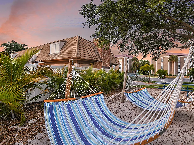 Take time to relax in the hammocks by the pool