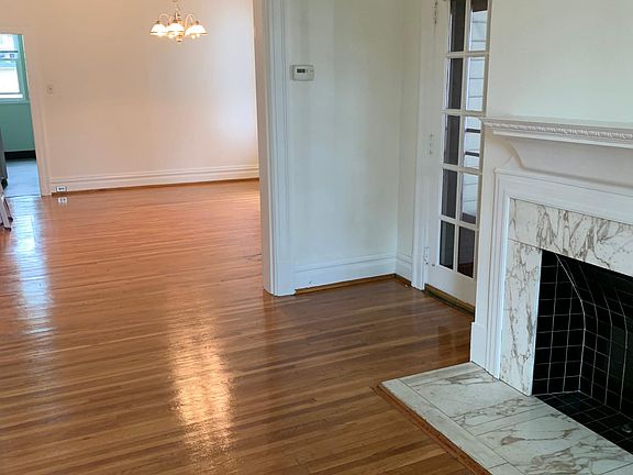 Living room with Dining room in the background.