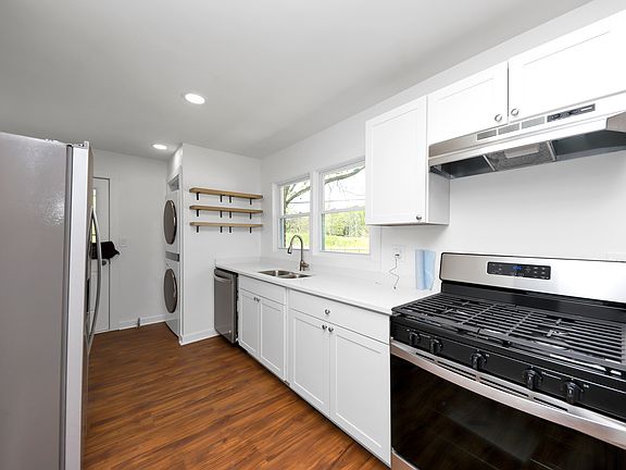 Shared furnished and stocked kitchen with stainless steel appliances. Shared washer and dryer.