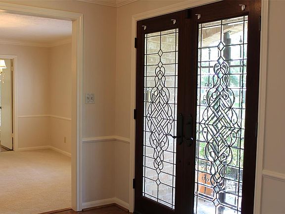 Double leaded glass front doors are a great welcome to guests. Welcome Home!