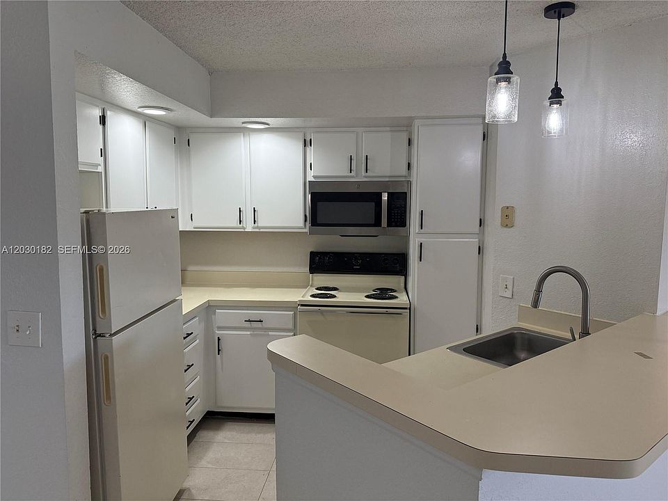 1st image of 3330 Pinewalk Dr N APT 1623