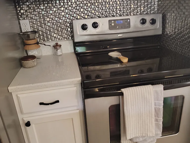 NEW...stove microwave,double side refrigerator,dishwasher,washer and dryer machine!