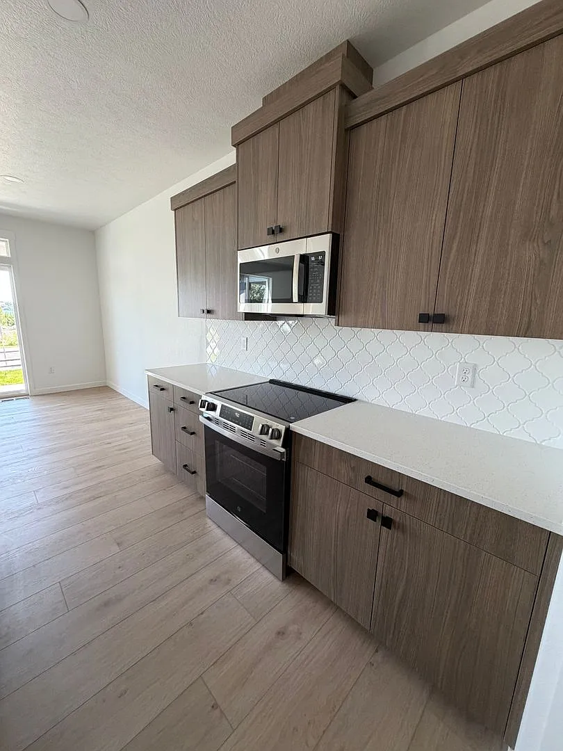 Reduced Rent! New Construction Condo Now $2,200/mo!! — Photo 4