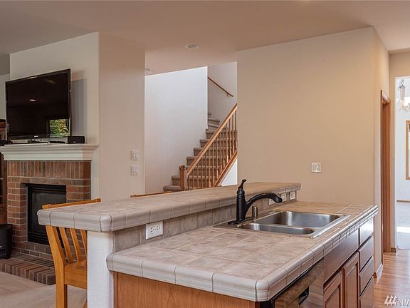 Another view of the eating bar and staircase.
