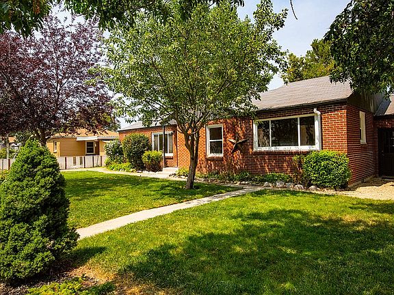 Front yard with sprinklers