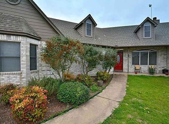 Front entrance with a relaxing porch!
