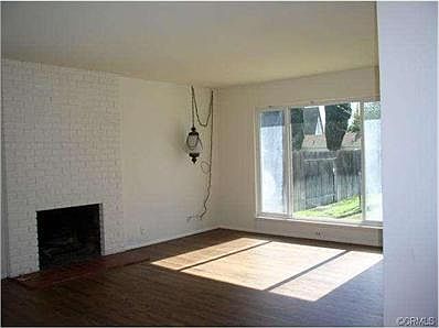 Living Room looking to back yard, large window allows lots of li