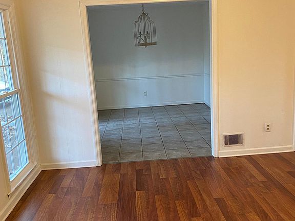 dining room off great room, with tiled floors