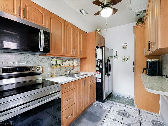 3rd image of 560 NW 97th St