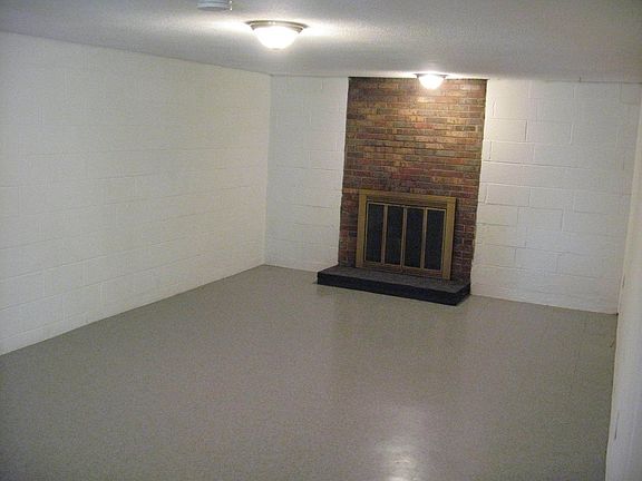 downstairs den with fireplace