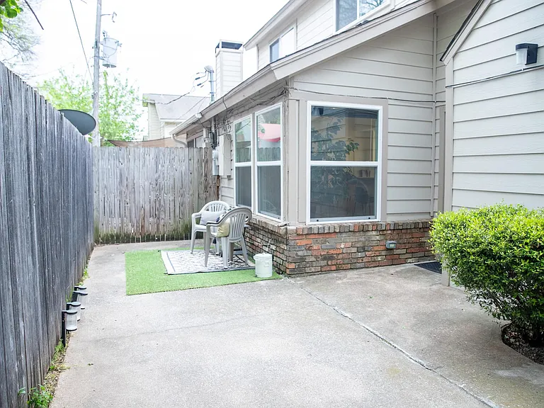 Private Patio with seating, Artificial grass for Fur babies