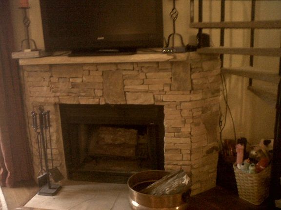 real stone surround wood or gas logs