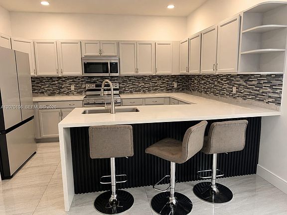 3rd image of 9229 W 33rd Way