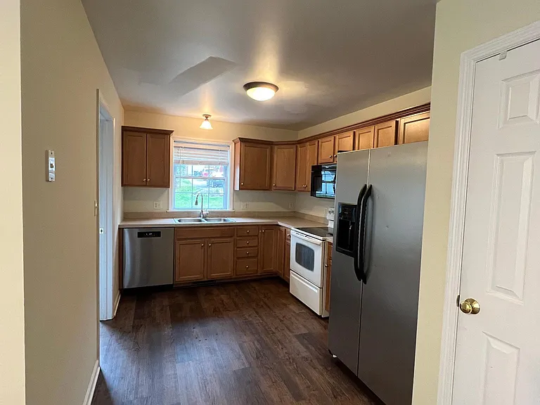 Kitchen area. Stove, dishwasher, and microwave are maintained by landlord.