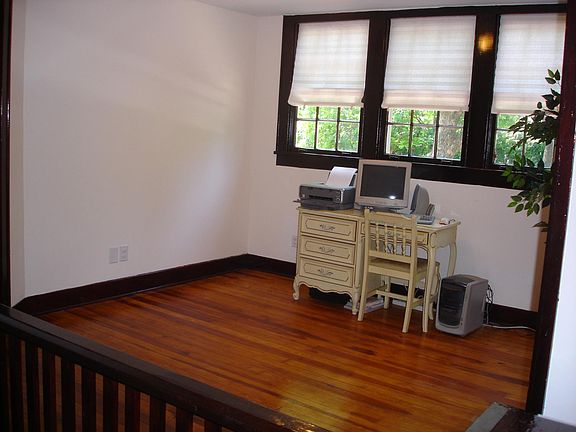 This area could be a study or dining room