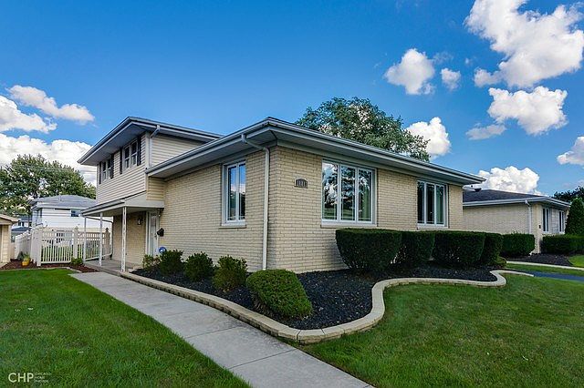 Face brick all around, architectural shingles and a new driveway are just some of the features that await you!