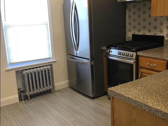 2nd image of 64-37 70th St #2