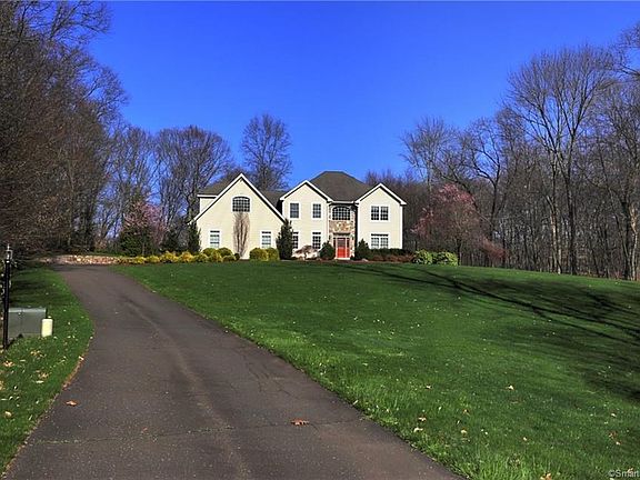 Gorgeous 3 acre professionally landscaped lot!