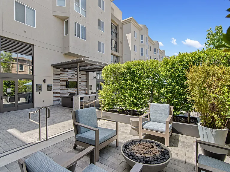 Outdoor Patio with Fire Pit and Seating at Aventine Apartments in Hercules, CA 94547