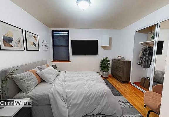 3rd image of 322 E 73rd St #Re