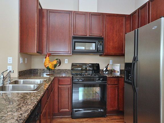 Granite counters, SS refrigerator ample storage.