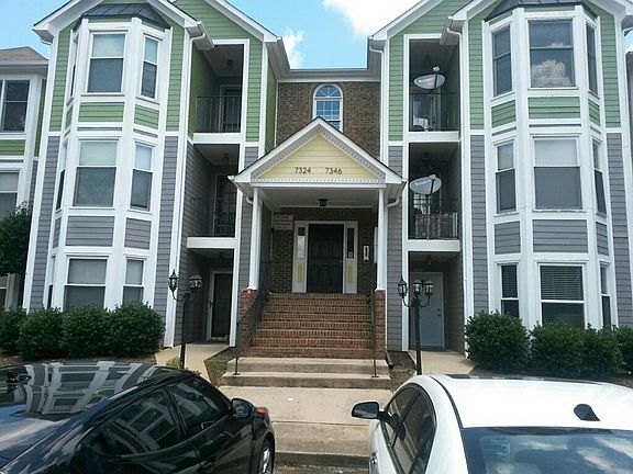 Exterior entrance with condo on third floor. Secure and safe.