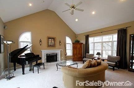 Living Room
						:
						20' vaulted ceiling, gas log fp, surd sound, SGD to Trex deck, step down