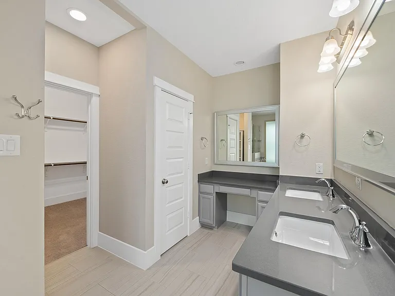 Master bath featuring double sink