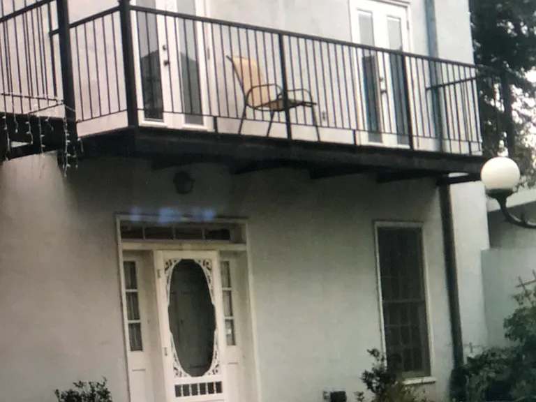Balcony off both bedrooms. This residence overlooks fountain courtyard and is in back of two story brick building 323 Morgan st.