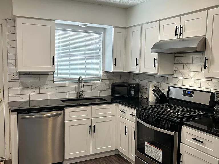 Kitchen - stainless washer and gas stove
