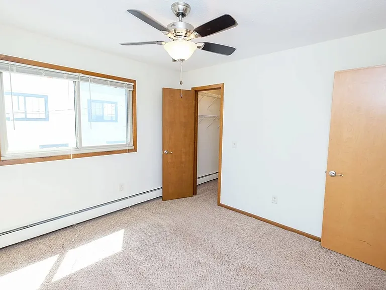 Welcome to Central Lakes of Uptown, where comfort meets modern living. This spacious, sunlit bedroom features a ceiling fan and ample closet space, perfect for your lifestyle. Don't miss your chance to make this place your homeschedule a tour today!