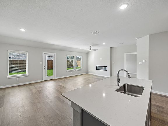 Open Floor Plan in the Emmy II home plan by Trophy Signature Homes - REPRESENTATIVE PHOTO