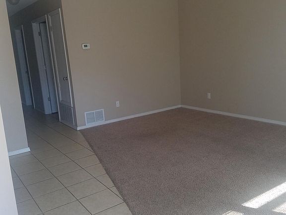 Living room with vaulted ceiling