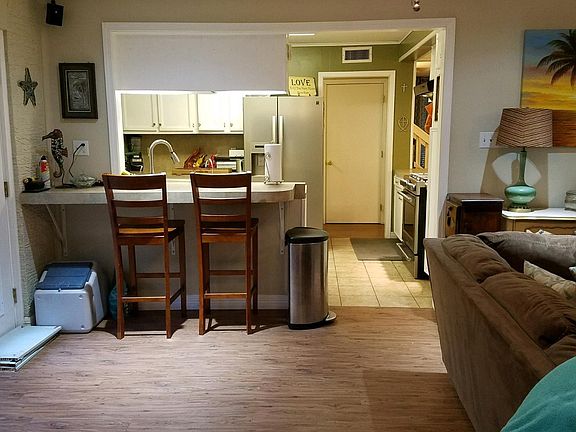 Looking into kitchen from living