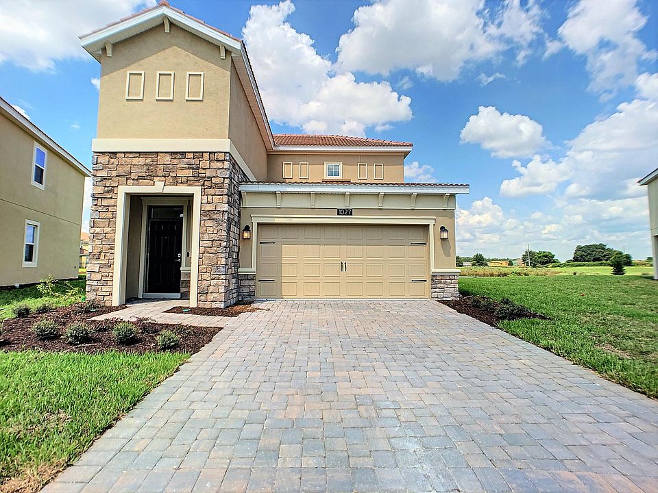 Front view with two-car garage