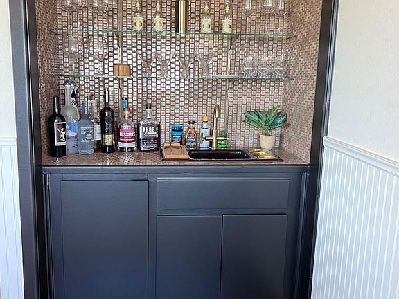 Upstairs bar adjacent to upstairs living room