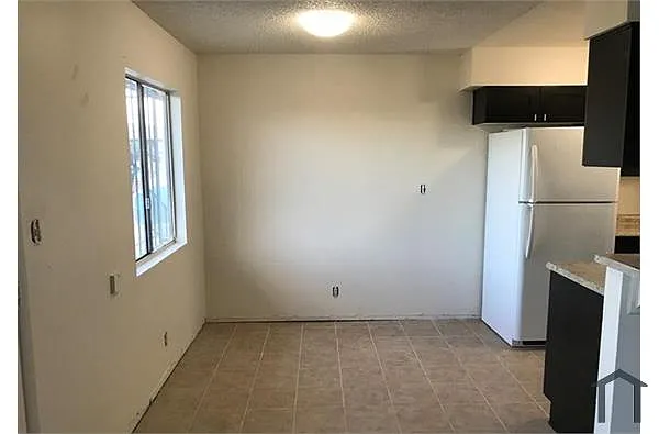 Building Photo - 1404 E Mesquite Ave #5